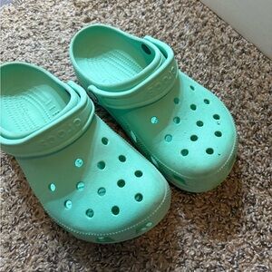 Teal crocs